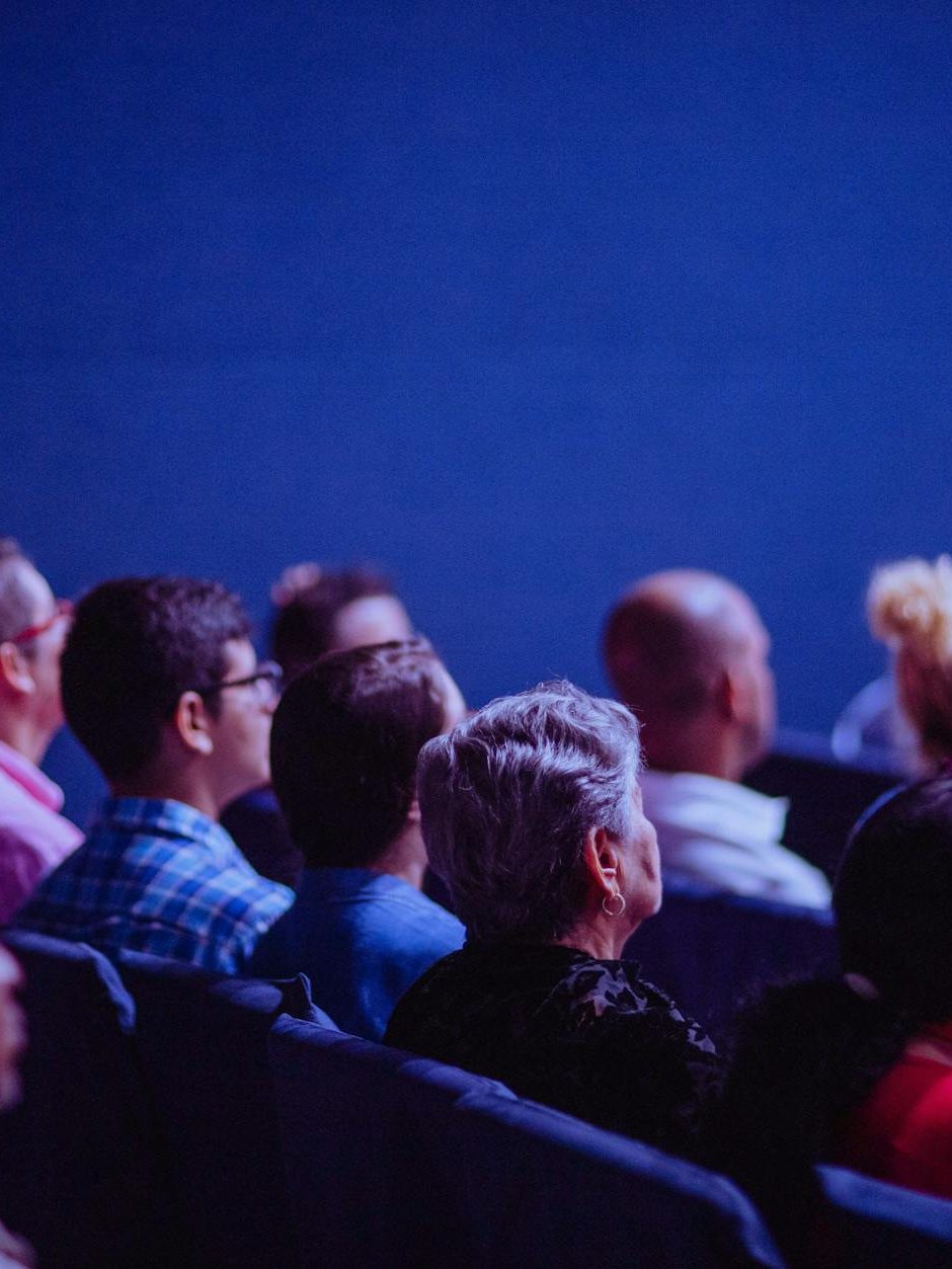 people sitting on gang chairs